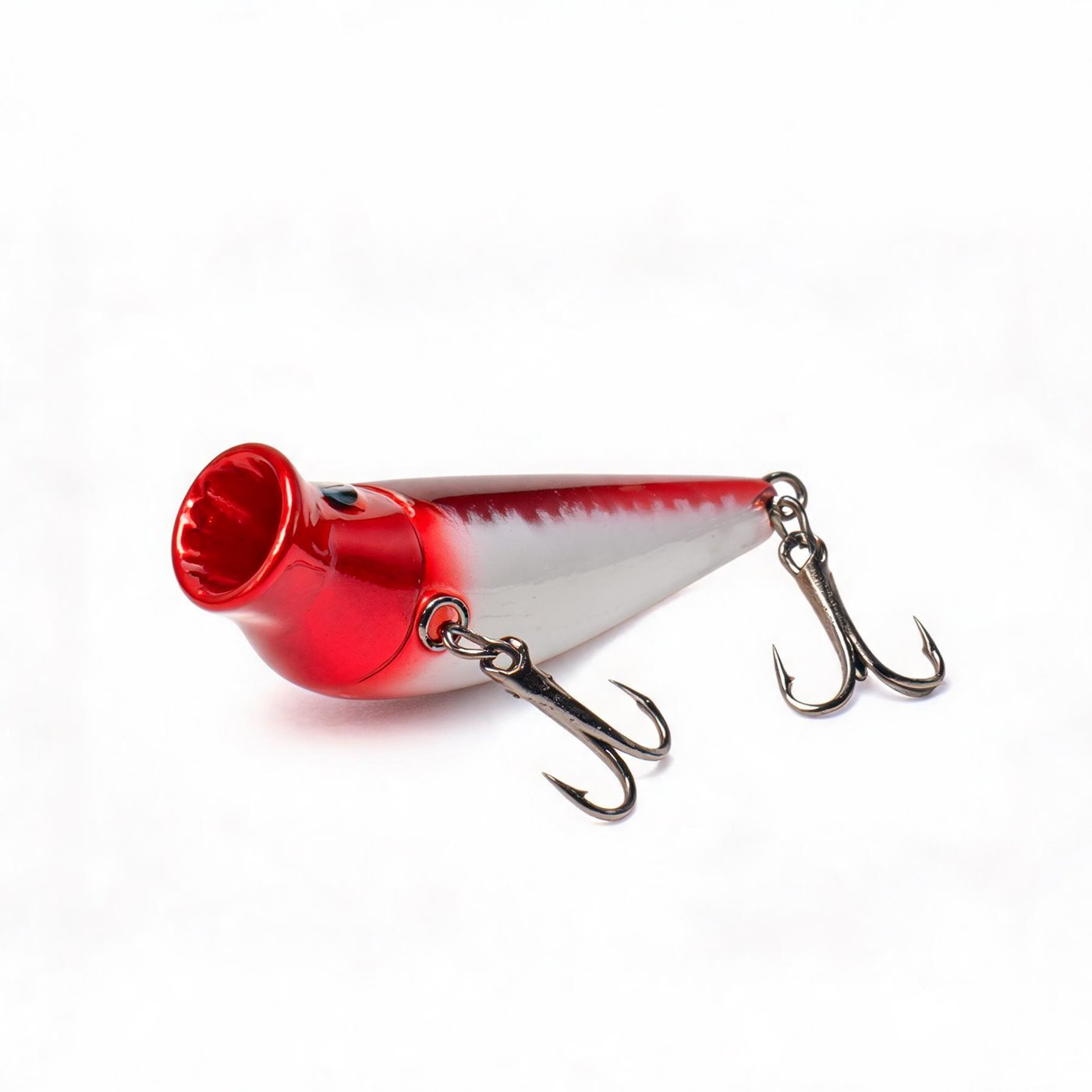 Bellcup 70 topwater popper: red head with a cupped face, white body and two treble hooks